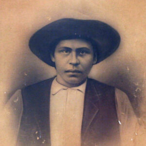Drawing of Native American man in vest and black hat