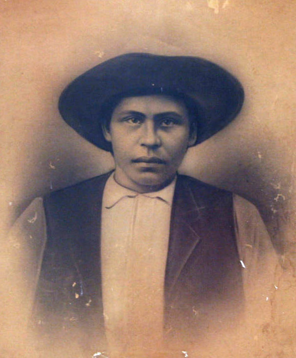 Drawing of Native American man in vest and black hat