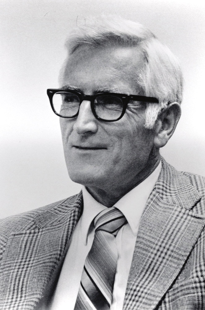 White man with white hair in suit