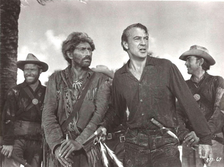 photo of four white men dressed as frontiersmen