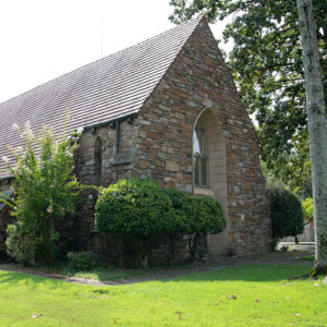 Stone church building with slate roof