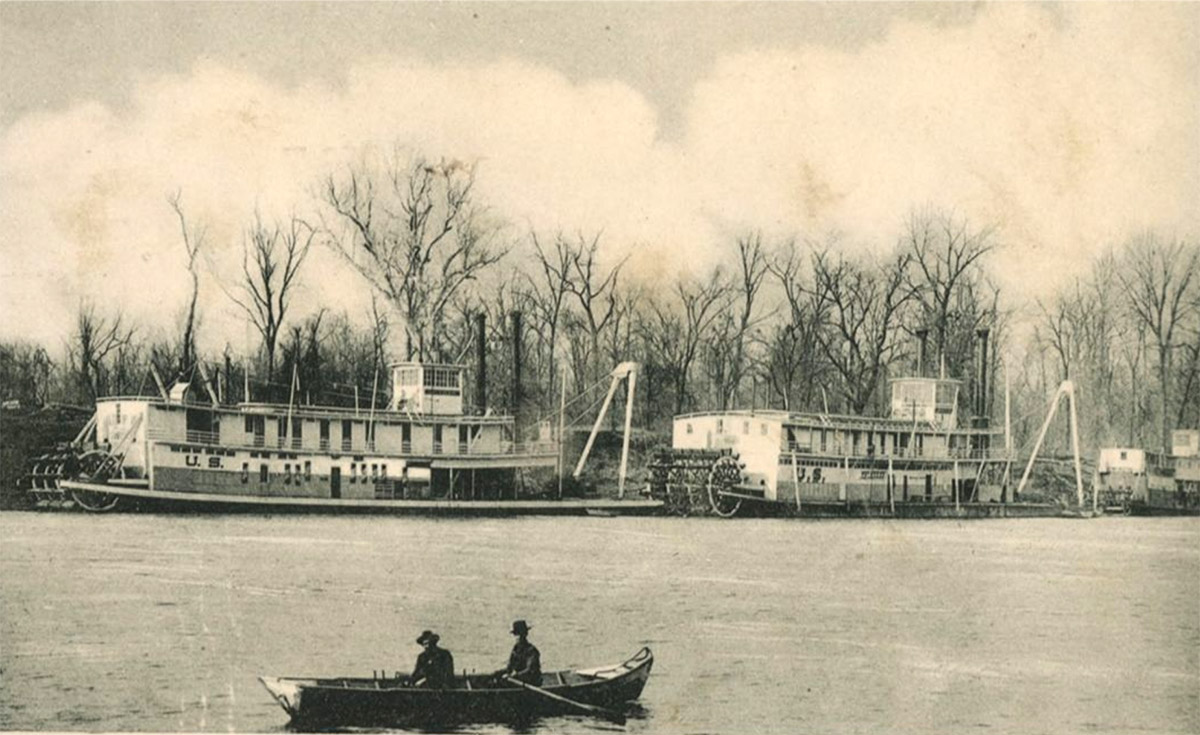 Small rowboat in front of two large paddlewheel steamers