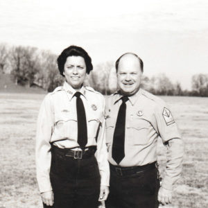 White woman and white man in uniform