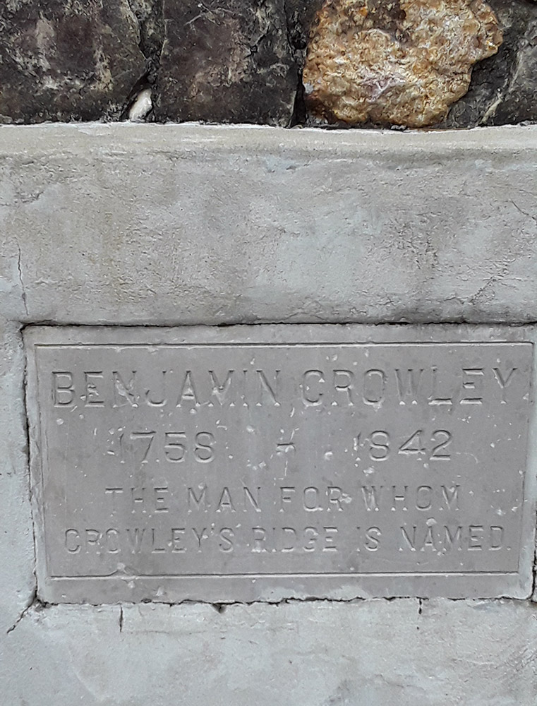 Concrete monument with lettering