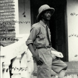African American man wearing safari suit and hat