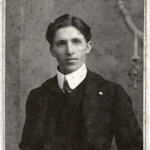 young white man wearing suit standing