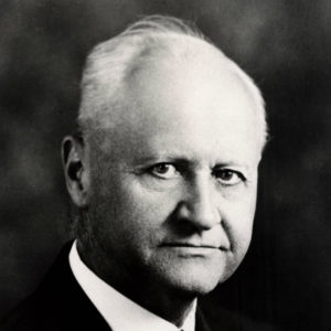 Portrait of white man in suit and tie