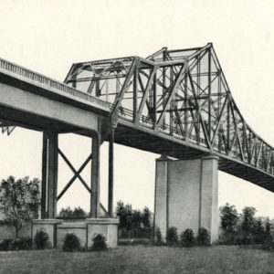 metal and concrete bridge over river