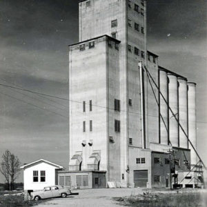 Multistory concrete building with silos