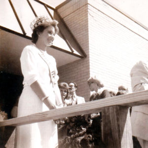 White woman in white dress