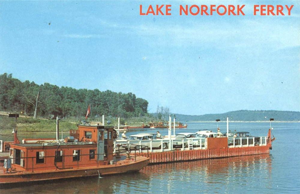 Boat on lake adjacent to ferry