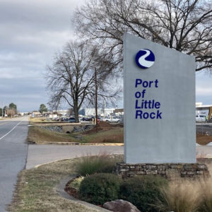 Sign "Port of Little Rock" with road and industrial buildings