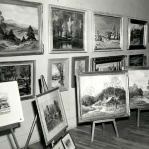Framed paintings on display