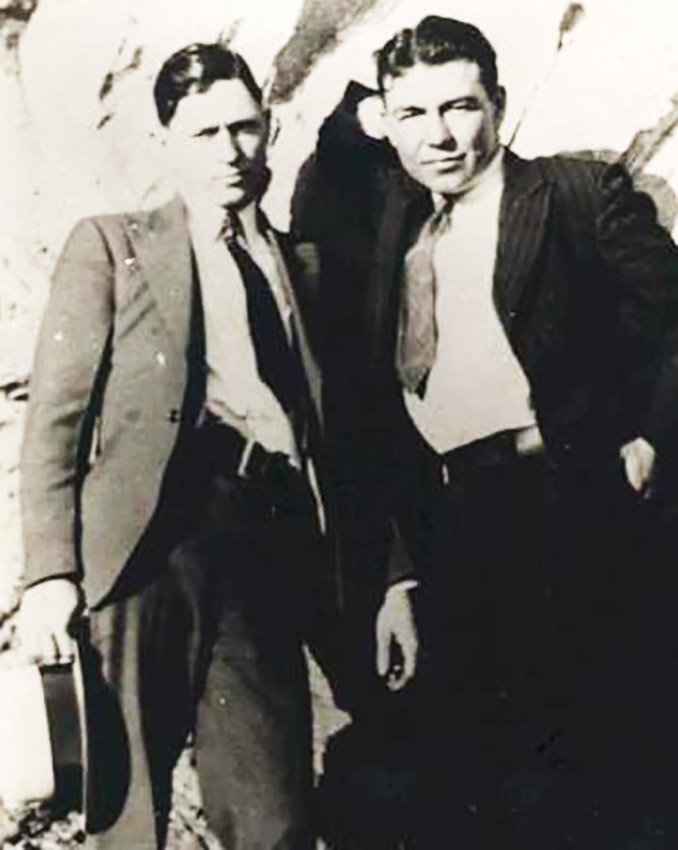 Two white men wearing suits and ties