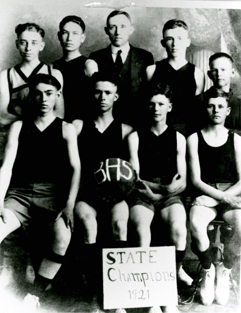 Group of white men in gym uniforms