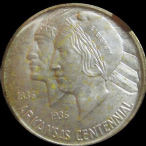 Half dollar coin showing an Indian head and the head of a 1930s woman