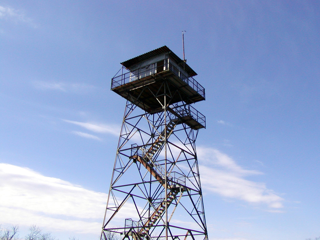 Small structure atop large tower