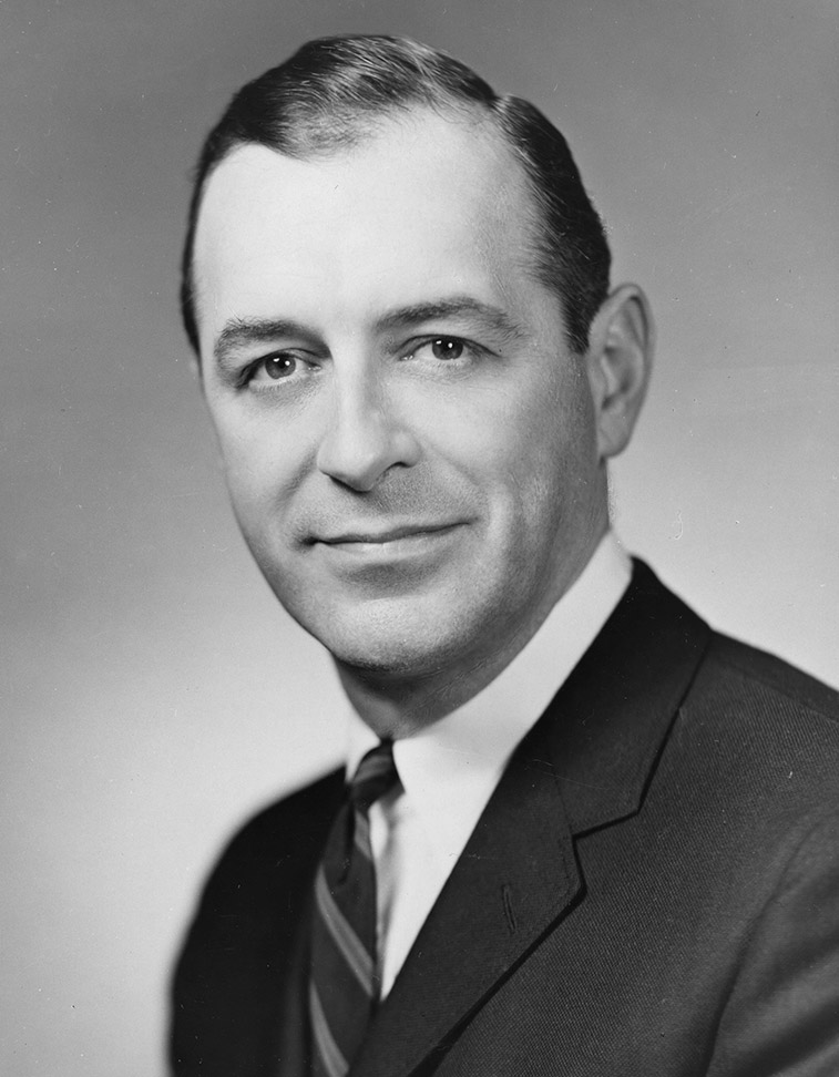 Portrait of white man in suit and tie