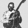 African American man holding guitar