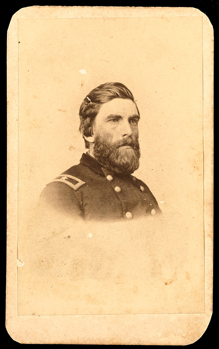 Head and shoulders of white bearded man in military garb