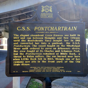 Black sign with yellow letters saying "CSS Pontchartrain" and giving historical information
