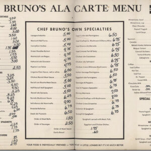 Restaurant menu with prices written by hand