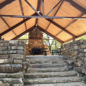 Stone stairs leading to fireplace and shelter