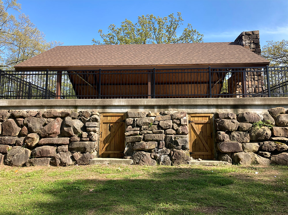 Stone and wood picnic shelter