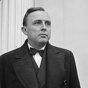 White man in suit and bow tie