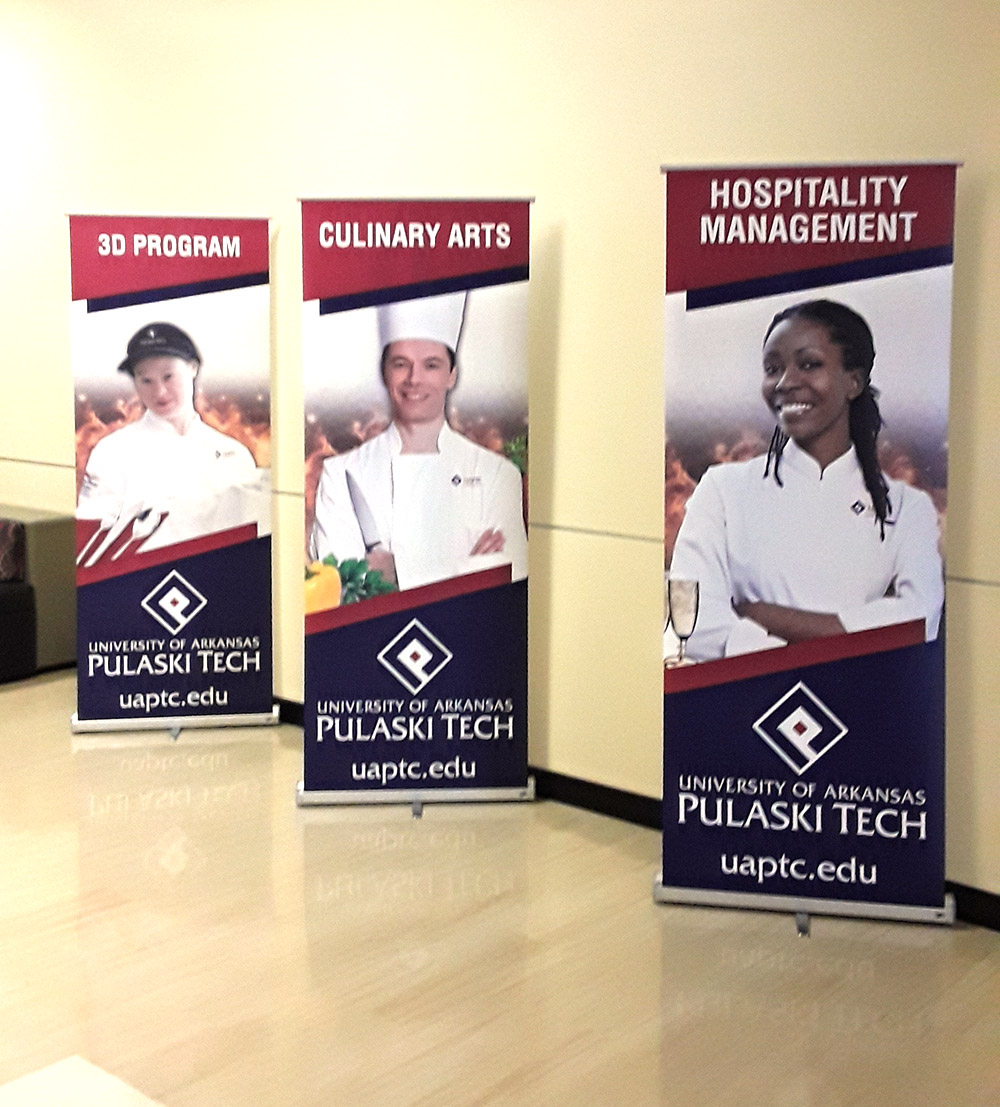 Three displays advertising "3D Program" "Culinary Arts" and "Hospitality Management"