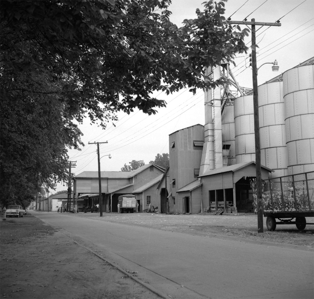 Row of buildings and silos