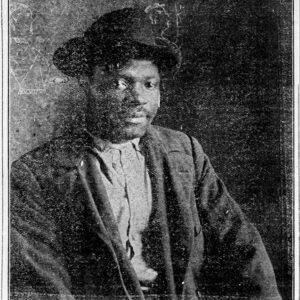 African American man wearing hat in newspaper photo