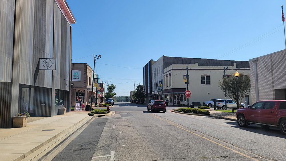 Small town street lined with multistory businesses
