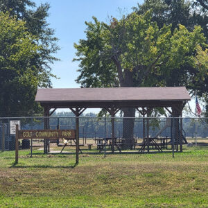 Small park with pavilion and picnic tables
