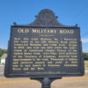 Historical sign giving information about the Old Military Road through the area