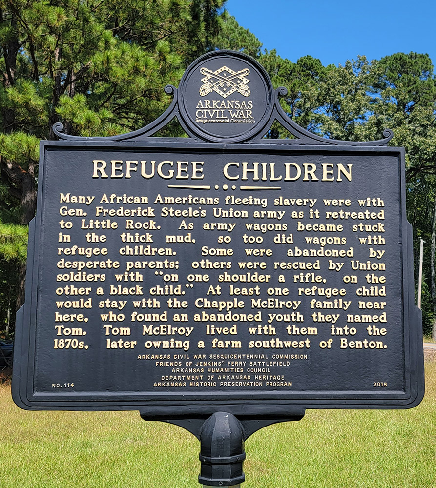 Metal sign "Refugee Children"