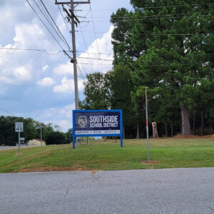 Large blue sign saying "Southside School District"