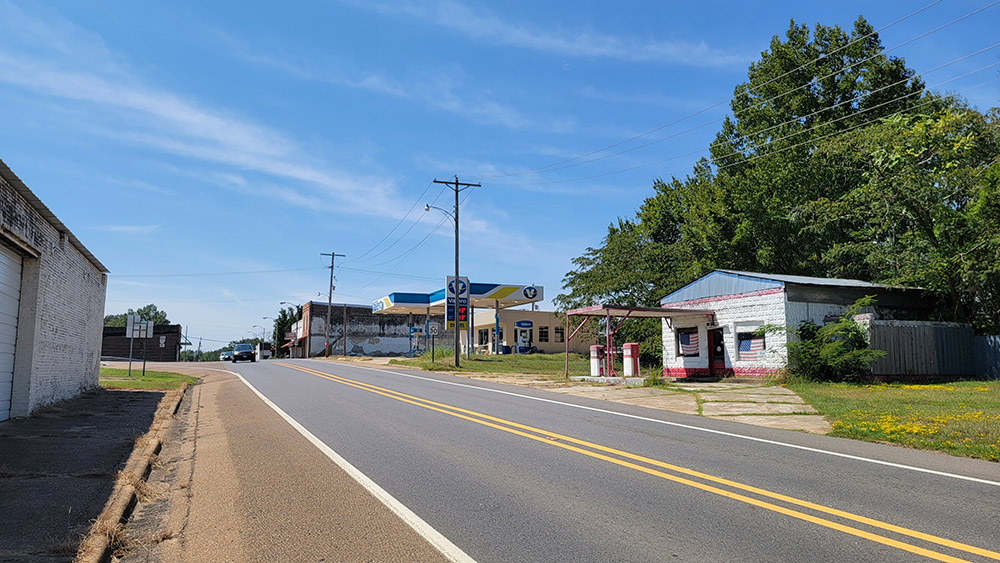 Small town street scene with businesses lining street