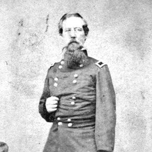 bearded white man in military garb standing
