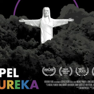 Movie poster featuring white statue of Christ among trees