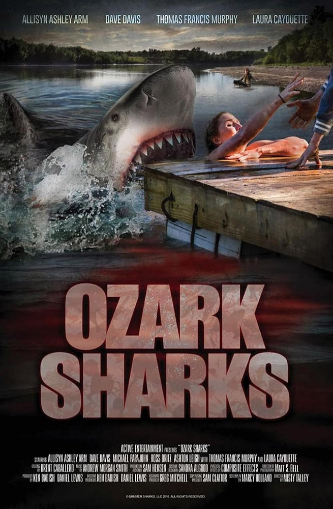 Movie poster featuring woman trying to climb aboard a dock as a shark emerges from water behind her
