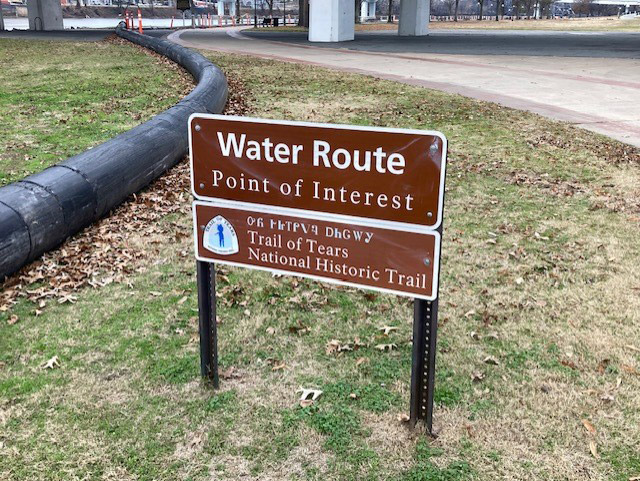Sign about the Trail of Tears Water Route next to walking path