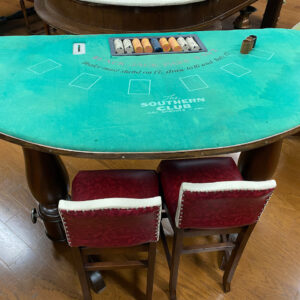 A green felt poker table
