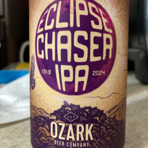 Can of beer with a purple circle containing the words "Eclipse Chaser I.P.A. 1918 2024"